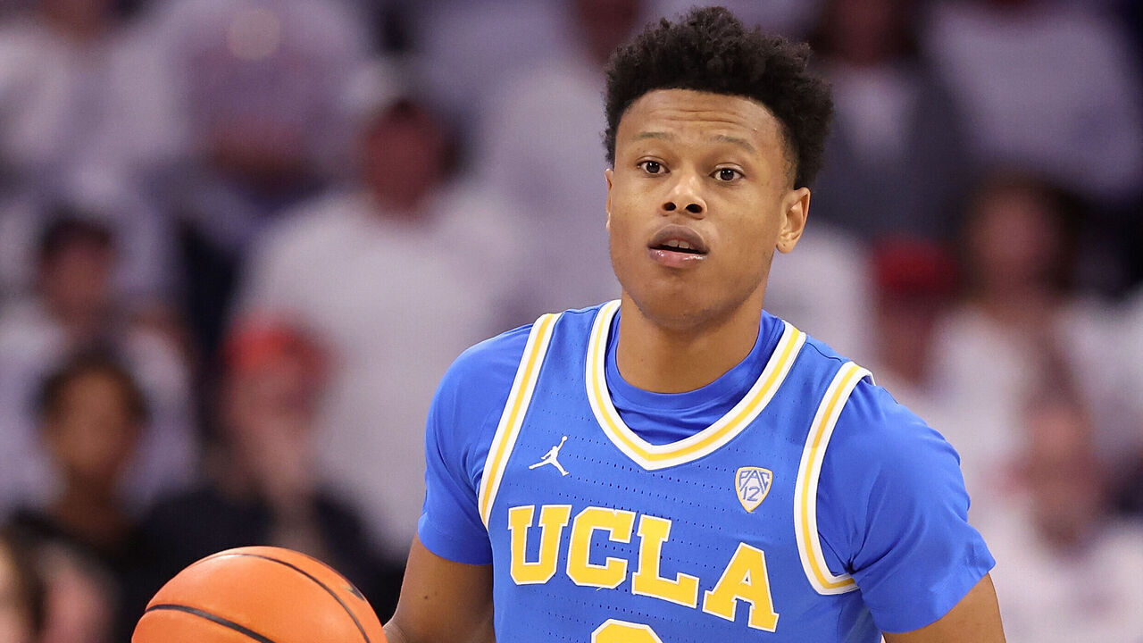 TUCSON, ARIZONA - JANUARY 21: Jaylen Clark #0 of the UCLA Bruins handles the ball during the second half of the NCAA game at McKale Center on January 21, 2023 in Tucson, Arizona. The Wildcats defeated the Bruins 58-52.