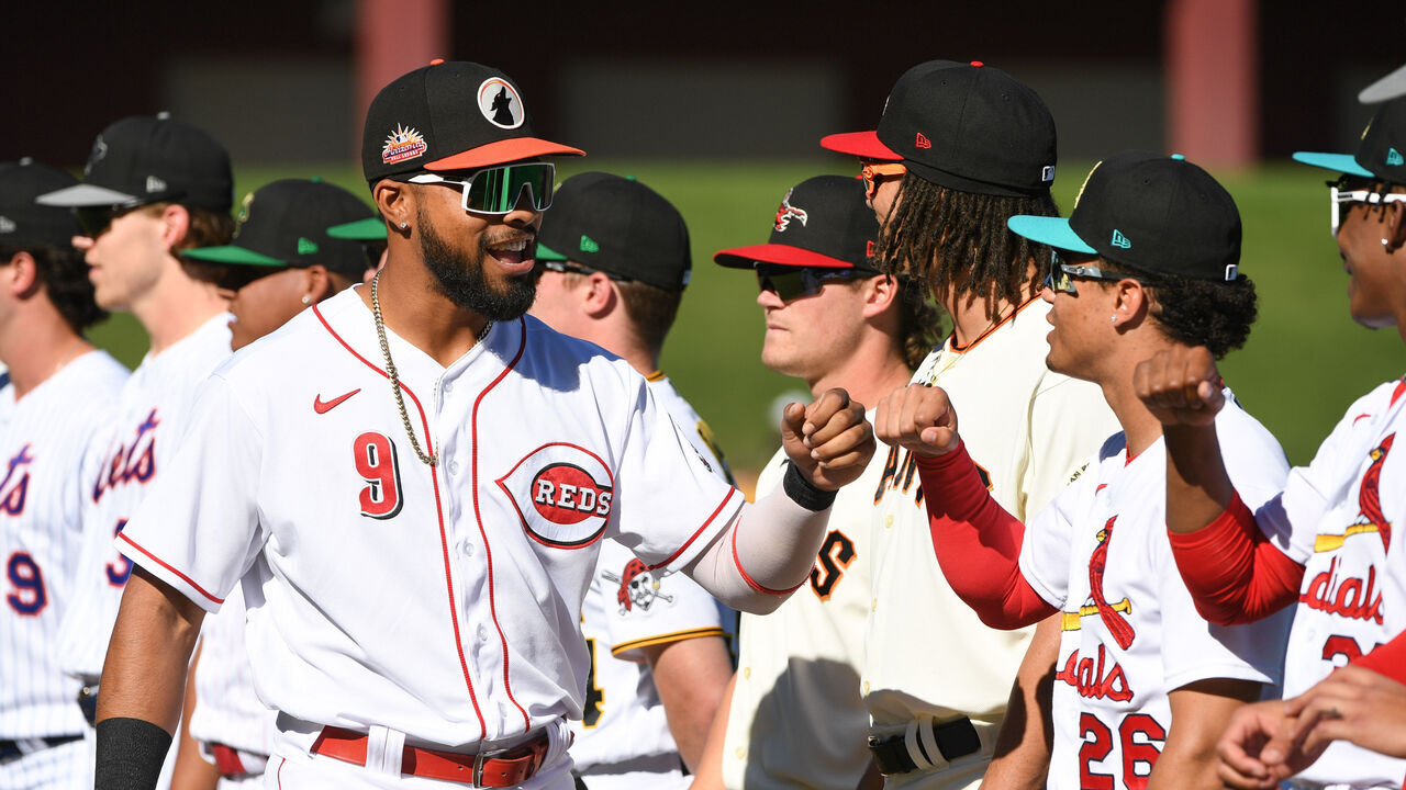 MESA, AZ - NOVEMBER 06: Rece Hinds #9 of the National League Fall Stars fist-bumps teammates before the game between the American League Fall Stars and the National League Fall Stars at Sloan Park on Sunday, November 6, 2022 in Mesa, Arizona.