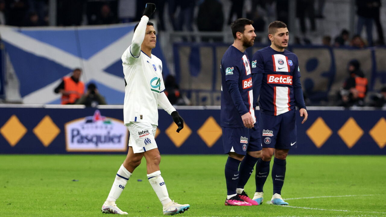 MARSEILLE, FRANCE - FEBRUARY 08: Alexis Sanchez of Marseille celebrates after scoring the first goal of his team via penalty next to Lionel Messi of Paris Saint-Germain during the French Cup round of 16 match between Olympique de Marseille and Paris Saint-Germain at Orange Velodrome on February 08, 2023 in Marseille, France.