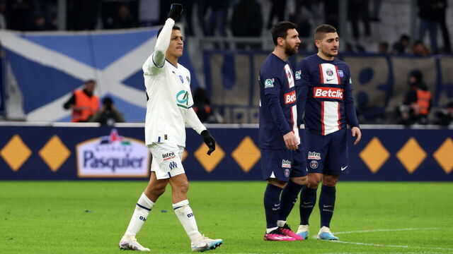 MARSEILLE, FRANCE - FEBRUARY 08: Alexis Sanchez of Marseille celebrates after scoring the first goal of his team via penalty next to Lionel Messi of Paris Saint-Germain during the French Cup round of 16 match between Olympique de Marseille and Paris Saint-Germain at Orange Velodrome on February 08, 2023 in Marseille, France.