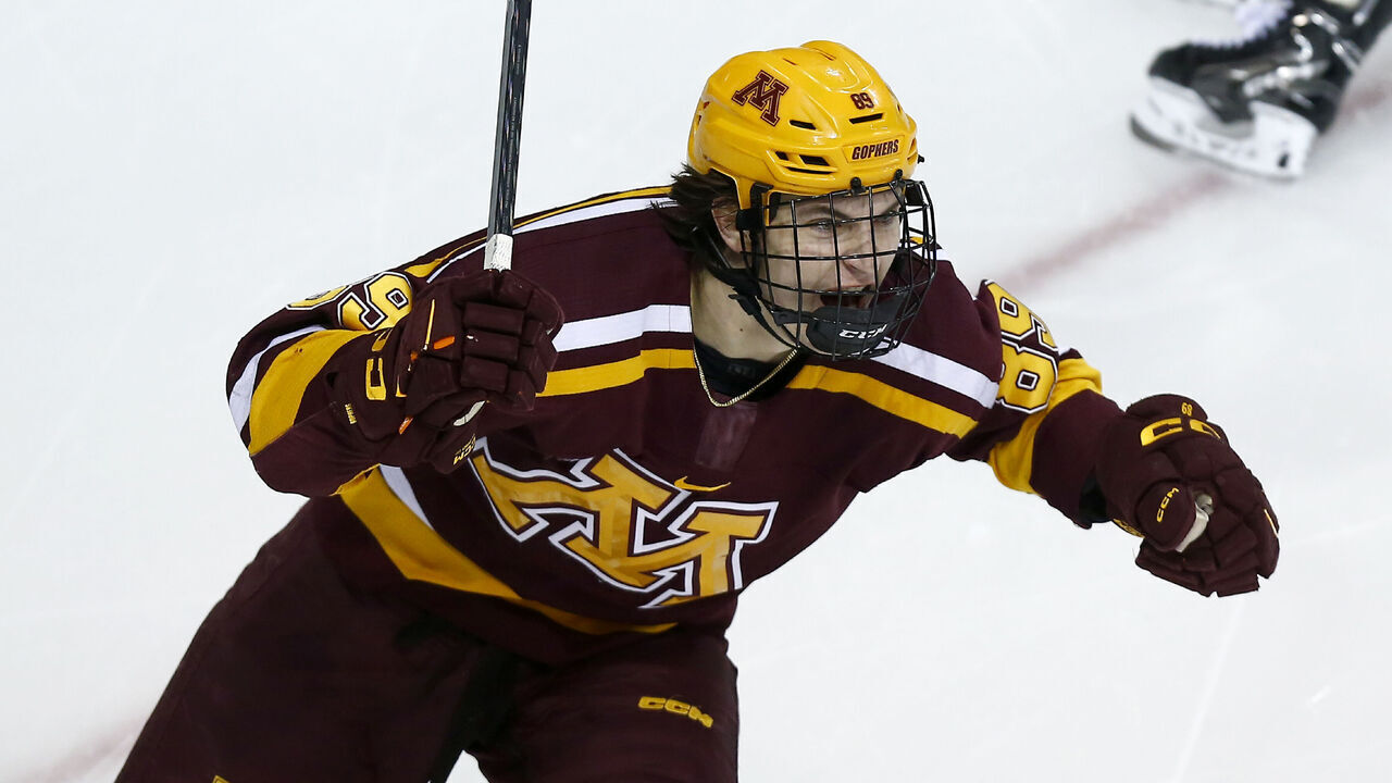 SOUTH BEND, IN - JANUARY 14: Minnesota Gophers forward Matthew Knies (89) celebrates his goal in the second period of play during a mens college Hockey game between the Minnesota Gophers and the Notre Dame Fighting Irish on January 14, 2023 at Compton Family Ice Arena in South Bend, IN.
