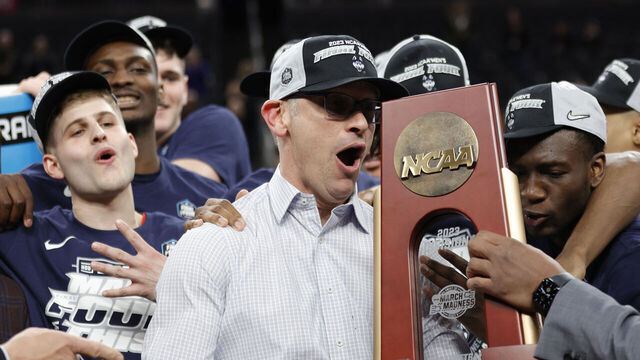 LAS VEGAS, NEVADA - MARCH 25: Head coach Dan Hurley of the Connecticut Huskies celebrates with players after defeating the Gonzaga Bulldogs 82-54 in the Elite Eight round of the NCAA Men's Basketball Tournament at T-Mobile Arena on March 25, 2023 in Las Vegas, Nevada.