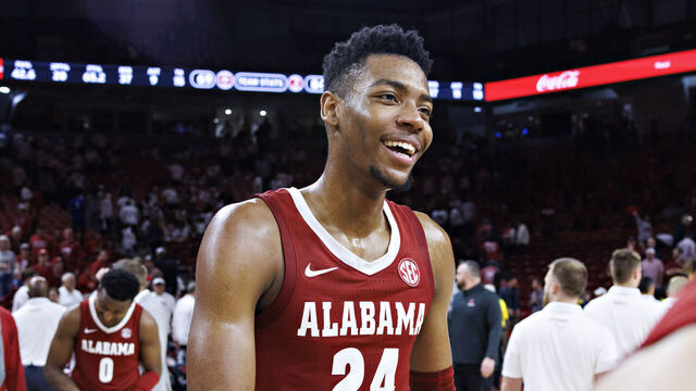 FAYETTEVILLE, ARKANSAS - JANUARY 11: Brandon Miller #24 of the Alabama Crimson Tide smiles after a game against the Arkansas Razorbacks at Bud Walton Arena on January 11, 2023 in Fayetteville, Arkansas. The Crimson Tide defeated the Razorbacks 84-69.