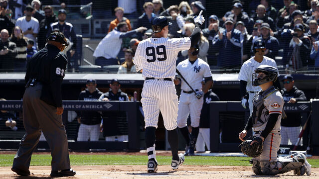 NEW YORK, NY - MARCH 30: Aaron Judge #99 of the New York Yankees celebrates after hitting a home run during the first inning against the San Francisco Giants on Opening Day at Yankee Stadium on March 30, 2023, in New York, New York.