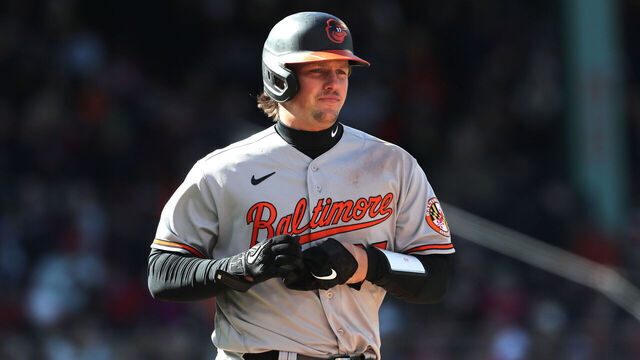 BOSTON, MASSACHUSETTS - MARCH 30: Adley Rutschman #35 of the Baltimore Orioles reacts during the fourth inning against the Boston Red Sox on Opening Day at Fenway Park on March 30, 2023 in Boston, Massachusetts.