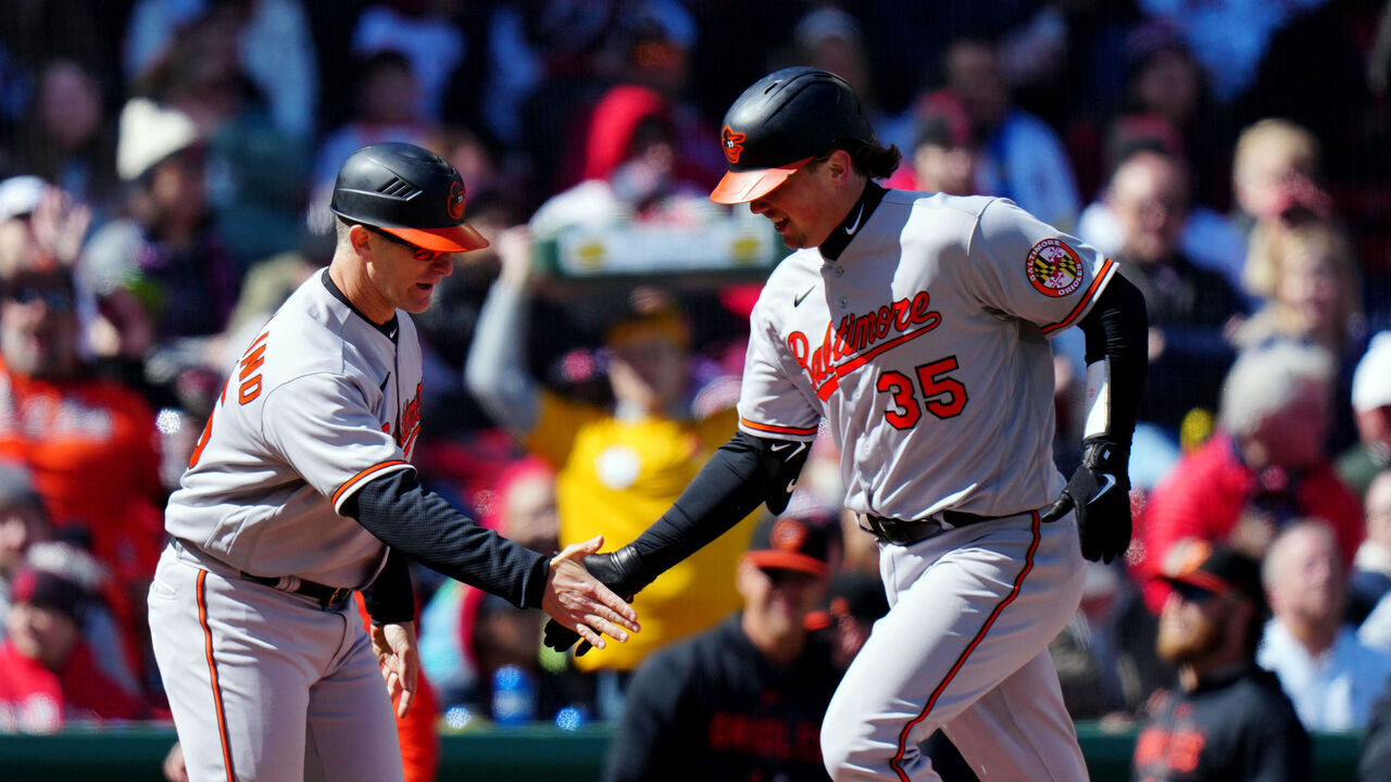 BOSTON, MA - MARCH 30: Adley Rutschman #35 of the Baltimore Orioles rounds the bases after hitting a solo home run in the first inning during the game between the Baltimore Orioles and the Boston Red Sox at Fenway Park on Thursday, March 30, 2023 in Boston, Massachusetts.