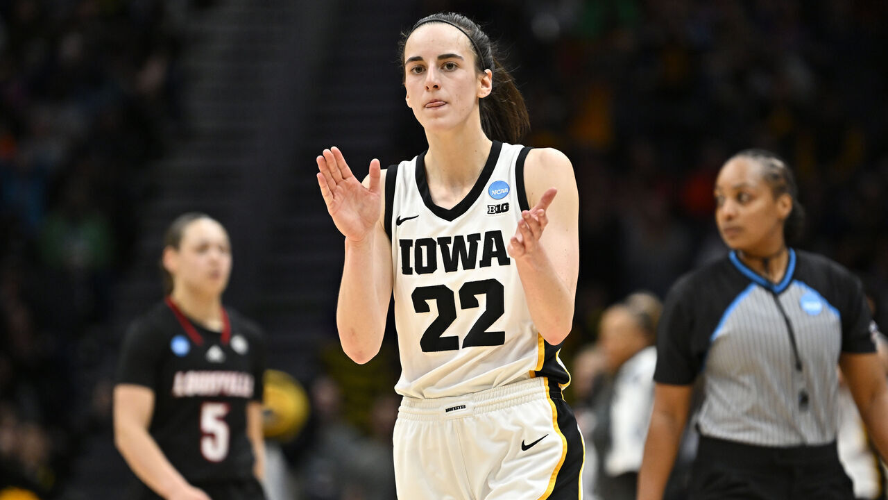 SEATTLE, WASHINGTON - MARCH 26: Caitlin Clark #22 of the Iowa Hawkeyes reacts during the fourth quarter of the game against the Louisville Cardinals in the Elite Eight round of the NCAA Women's Basketball Tournament at Climate Pledge Arena on March 26, 2023 in Seattle, Washington.