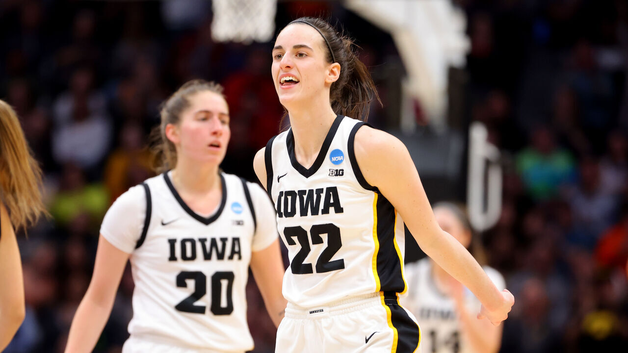 SEATTLE, WA - MARCH 26: Caitlin Clark #22 of the Iowa Hawkeyes reacts in the second half of the game against the Louisville Cardinals during the Elite Eight round of the 2023 NCAA Women's Basketball Tournament held at Climate Pledge Arena on March 26, 2023 in Seattle, Washington.