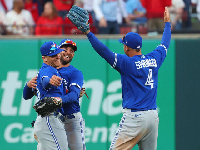 Which Cardinals players have also played for the Blue Jays? MLB