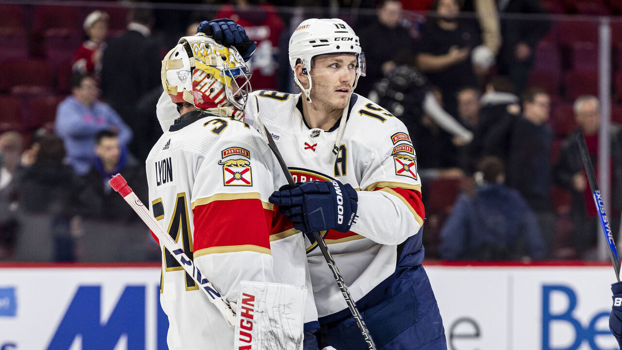 MONTREAL, CANADA - MARCH 30: Alex Lyon #34 and Matthew Tkachuk #19 of the Florida Panthers celebrate after winning the NHL regular season game against the Montreal Canadiens at the Bell Centre on March 30, 2023 in Montreal, Quebec, Canada.