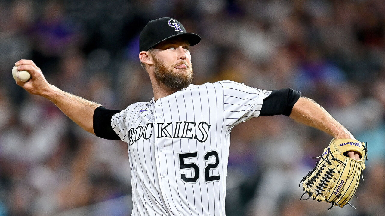 DENVER, CO - AUGUST 19: Daniel Bard #52 of the Colorado Rockies pitches against the San Francisco Giants in the ninth inning of a game at Coors Field on August 19, 2022 in Denver, Colorado.