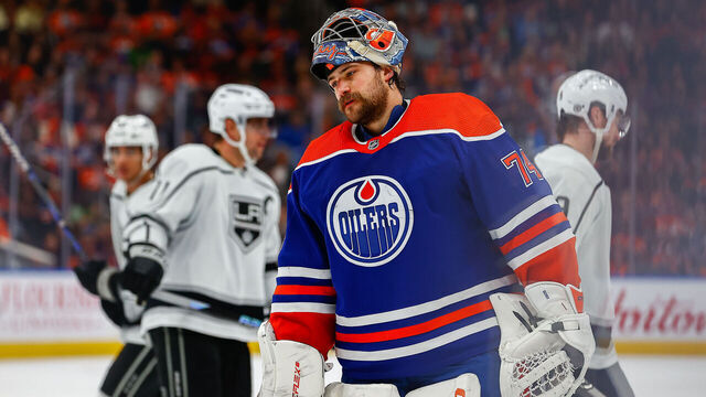 EDMONTON, AB - MARCH 30: Edmonton Oilers Goalie Stuart Skinner (74) takes his mask off and takes a moment to re set in the second period of the Edmonton Oilers game versus the Los Angeles Kings on March 30, 2023 at Rogers Place in Edmonton, AB.