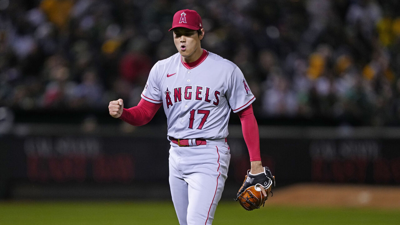 OAKLAND, CA - MARCH 30: Shohei Ohtani #17 of the Los Angeles Angels cheers during the game between the Los Angeles Angels and the Oakland Athletics at RingCentral Coliseum on Thursday, March 30, 2023 in Oakland, California.