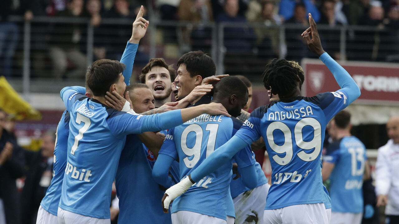 OLIMPICO GRANDE TORINO STADIUM, TURIN, PIEMONTE, ITALY - 2023/03/19: SSC Napoli French midfielder Tanguy Ndombele (C, from behind) celebrates with teammates Khvicha Kvaratskhelia (3rd L), Kim Min Jae (4th L) and others after scoring a goal during the Serie A football match between Torino and SSC Napoli. Napoli won 4-0.
