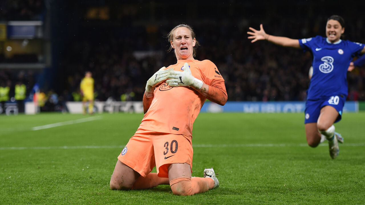 LONDON, ENGLAND - MARCH 30: Ann-Katrin Berger of Chelsea celebrates after making the winning save in a penalty shoot out during the UEFA Women's Champions League quarter-final 2nd leg match between Chelsea FC and Olympique Lyonnais at Stamford Bridge on March 30, 2023 in London, England.