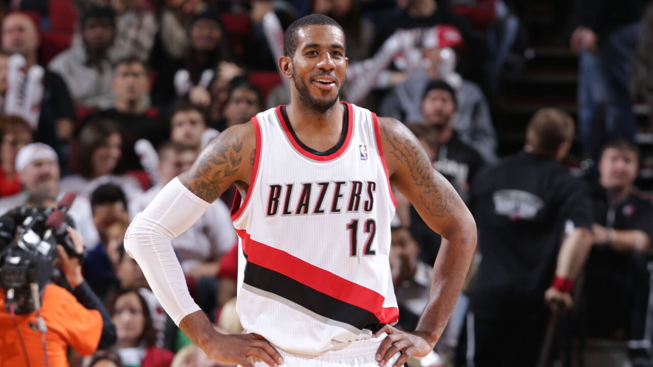 PORTLAND, OR - NOVEMBER 25: LaMarcus Aldridge #12 of the Portland Trail Blazers smiles during the game against the New York Knicks on November 25, 2013 at the Moda Center Arena in Portland, Oregon. Mandatory Copyright Notice: Copyright 2013 NBAE