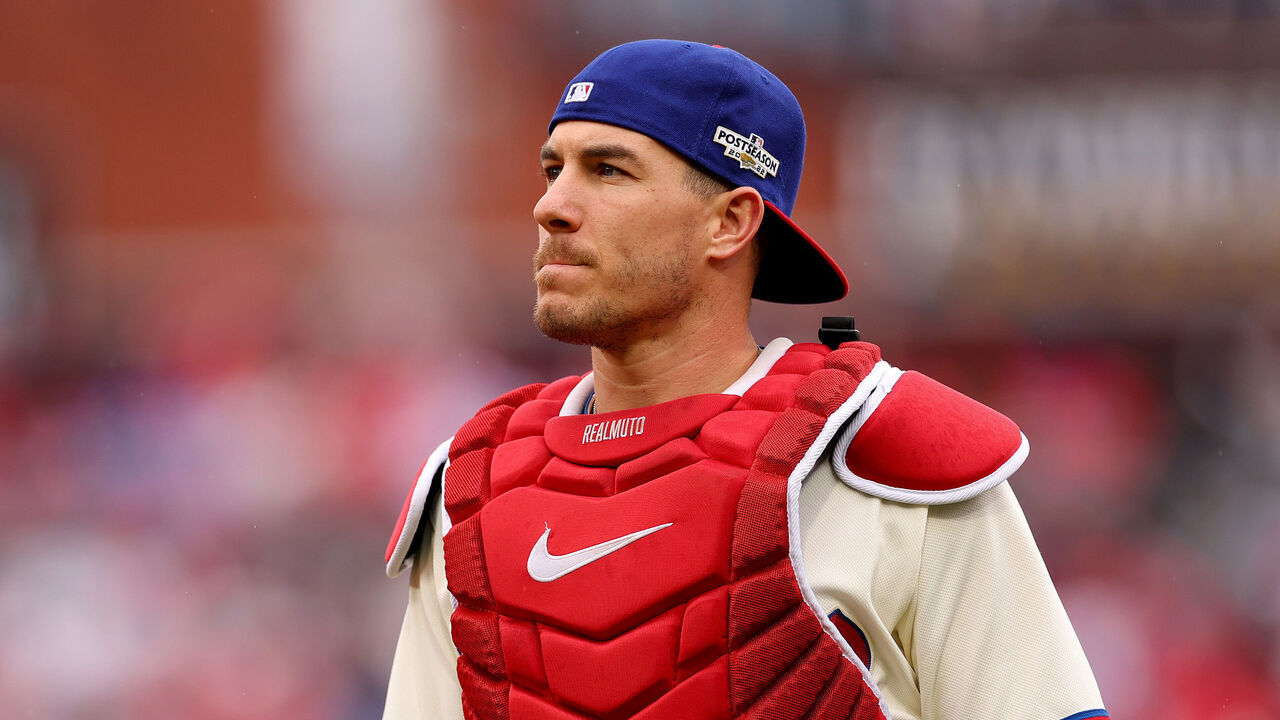 PHILADELPHIA, PENNSYLVANIA - OCTOBER 23: J.T. Realmuto #10 of the Philadelphia Phillies participates in warmups prior to game five of the National League Championship Series against the San Diego Padres at Citizens Bank Park on October 23, 2022 in Philadelphia, Pennsylvania.