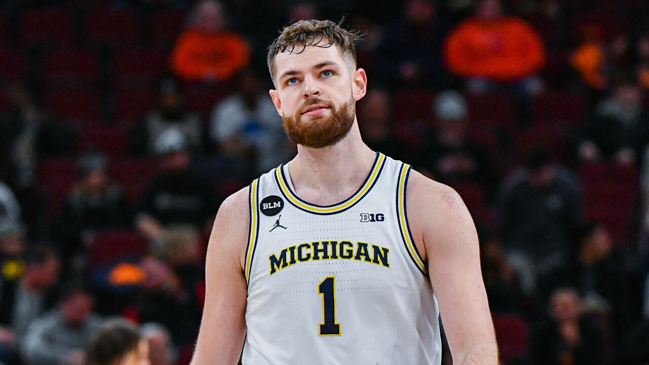 CHICAGO, ILLINOIS - MARCH 09: Hunter Dickinson #1 of the Michigan Wolverines reacts after a turnover during the second half of a Big Ten Men's Basketball Tournament Second Round game against the Rutgers Scarlet Knights at United Center on March 09, 2023 in Chicago, Illinois. The Rutgers Scarlet Knights won the game 62-50 over the Michigan Wolverines.