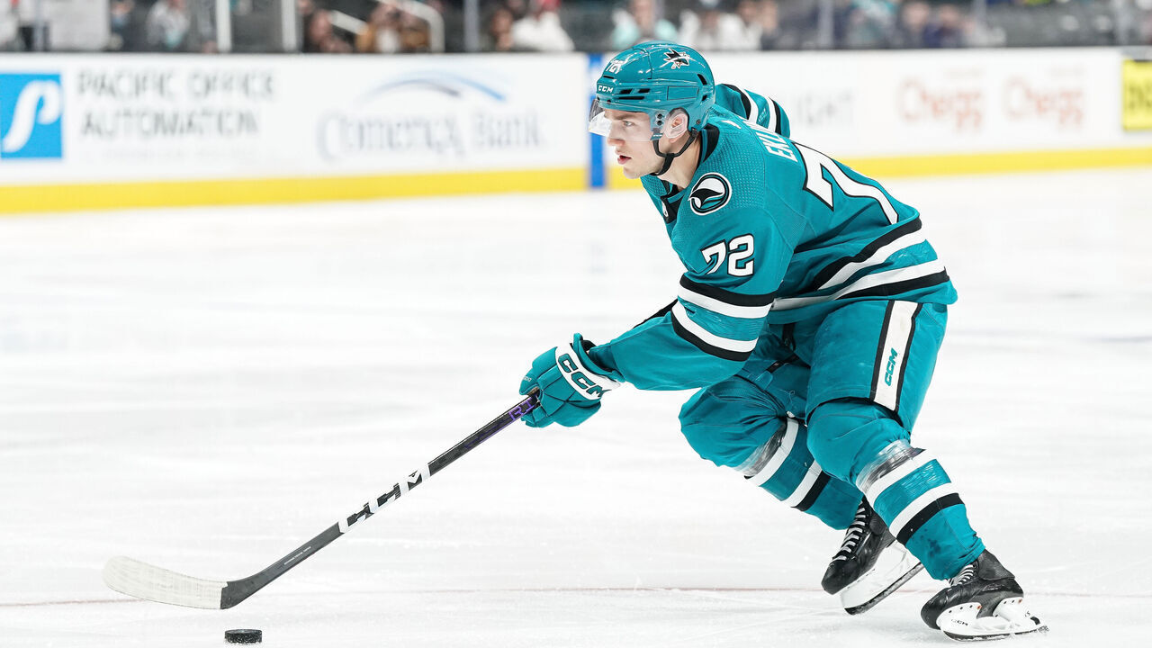 SAN JOSE, CA - MARCH 16: William Eklund #72 of the San Jose Sharks skates ahead with the puck against the Seattle Kraken at SAP Center on March 16, 2023 in San Jose, California.