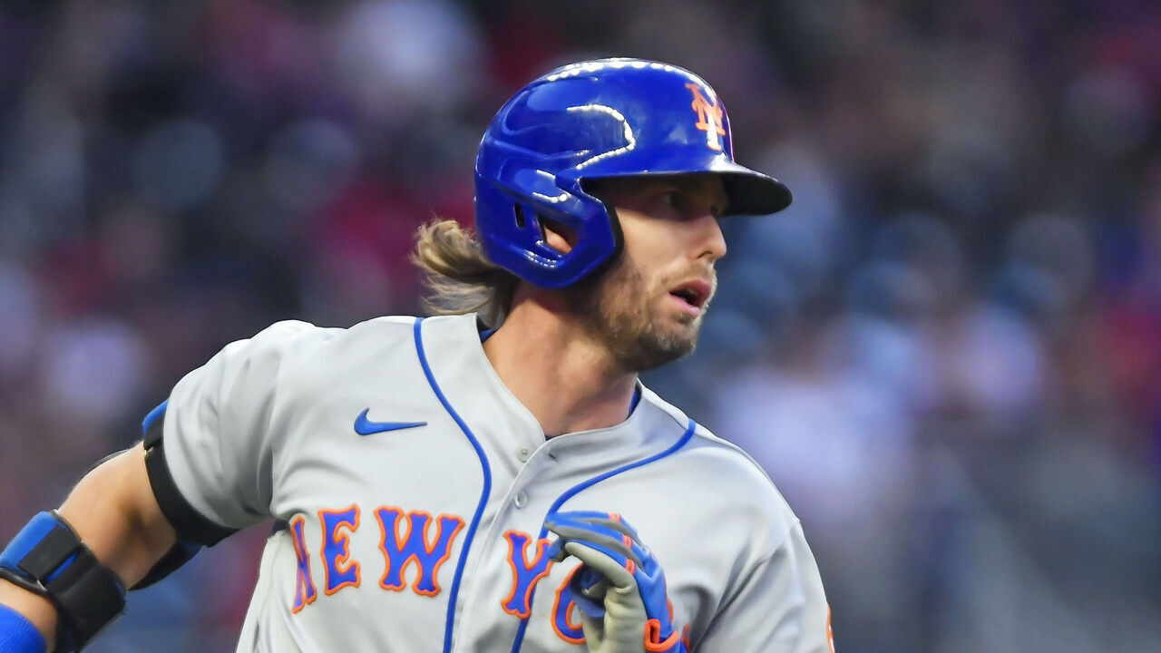 ATLANTA, GA - OCTOBER 02: New York Mets infielder Jeff McNeil runs down the first baseline after hitting a single during the first inning of a MLB game between the New York Mets and Atlanta Braves on Sunday, October 02, 2022 at Truist Park in Atlanta, GA.