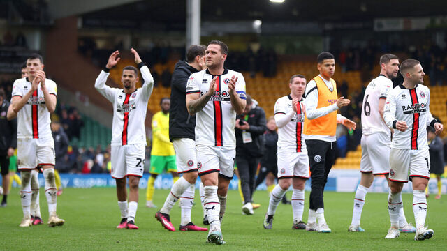 NORWICH, ENGLAND - APRIL 01: Sheffield United players celebrate victory following the Sky Bet Championship match between Norwich City and Sheffield United at Carrow Road on April 01, 2023 in Norwich, England.