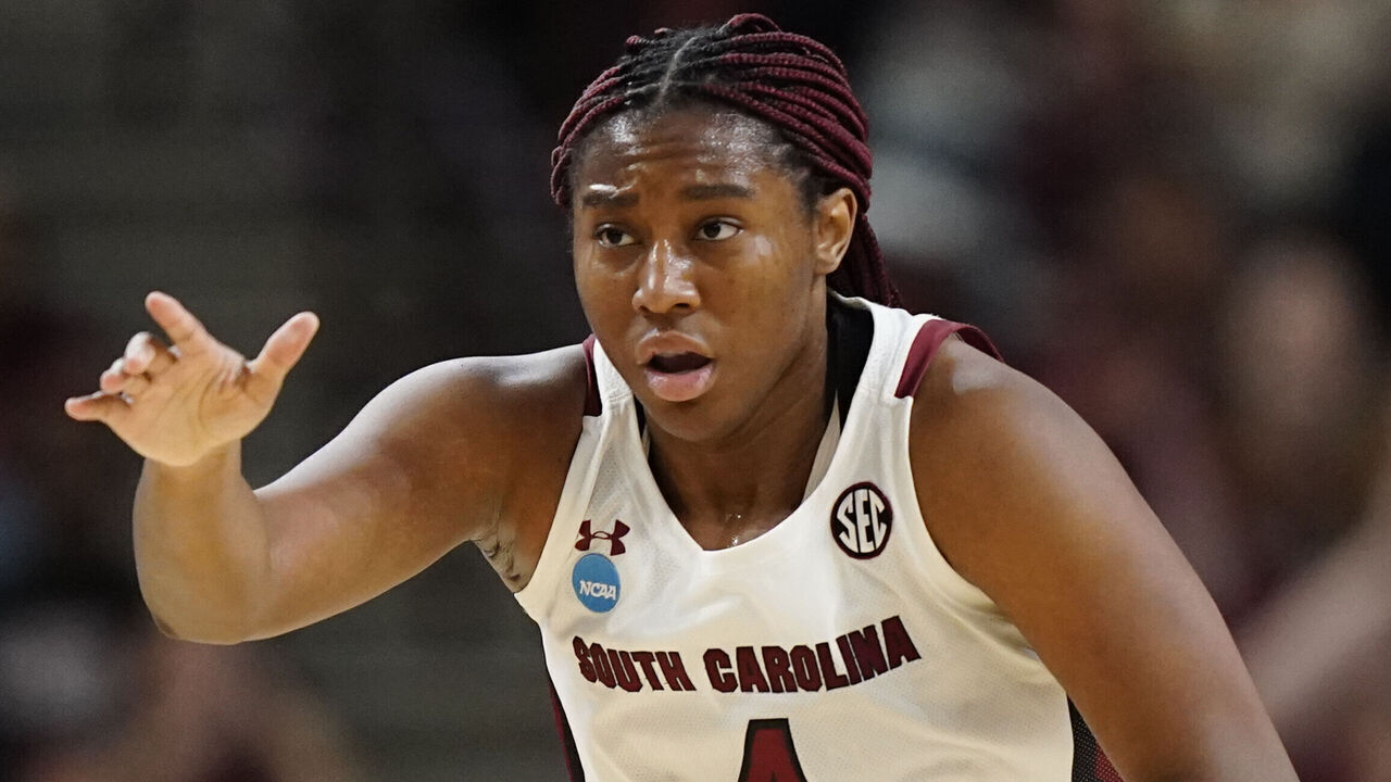 GREENVILLE, SC - MARCH 25: Aliyah Boston #4 of the South Carolina Gamecocks thanks a teammate during the Sweet Sixteen round of the 2023 NCAA Womens Basketball Tournament held at Bon Secours Wellness Arena on March 25, 2023 in Greenville, South Carolina.