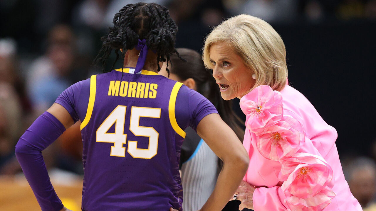 DALLAS, TEXAS - MARCH 31: Head coach Kim Mulkey of the LSU Lady Tigers coaches Alexis Morris #45 during the first half against the Virginia Tech Hokies during the 2023 NCAA Women's Basketball Tournament Final Four semifinal game at American Airlines Center on March 31, 2023 in Dallas, Texas.