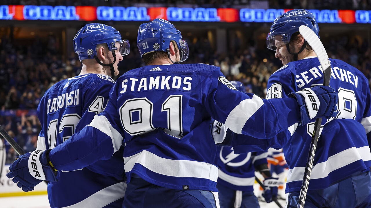 TAMPA, FL - APRIL 1: Steven Stamkos #91 of the Tampa Bay Lightning celebrates a goal with teammates Darren Raddysh #43 and Mikhail Sergachev #98 against the New York Islanders during the second period at Amalie Arena on April 1, 2023 in Tampa, Florida.