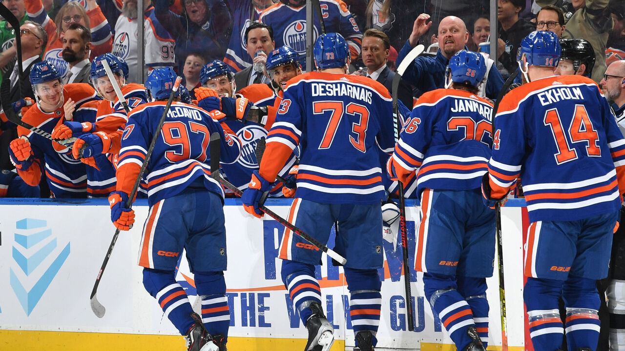 EDMONTON, CANADA - MARCH 30: Connor McDavid #97 of the Edmonton Oilers celebrates after his shorthanded goal and his 300th of his career during the third period against the Los Angeles Kings with Mattias Janmark #26, Mattias Ekholm #14 and Vincent Desharnais #73 on March 30, 2023 at Rogers Place in Edmonton, Alberta, Canada.