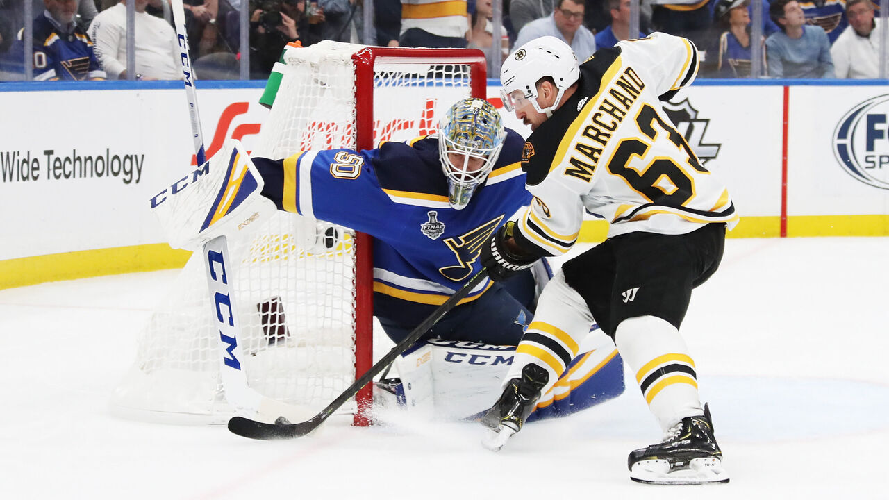 ST LOUIS, MISSOURI - JUNE 03: Jordan Binnington #50 of the St. Louis Blues makes a save against Brad Marchand #63 of the Boston Bruins in Game Four of the 2019 NHL Stanley Cup Final at Enterprise Center on June 03, 2019 in St Louis, Missouri.