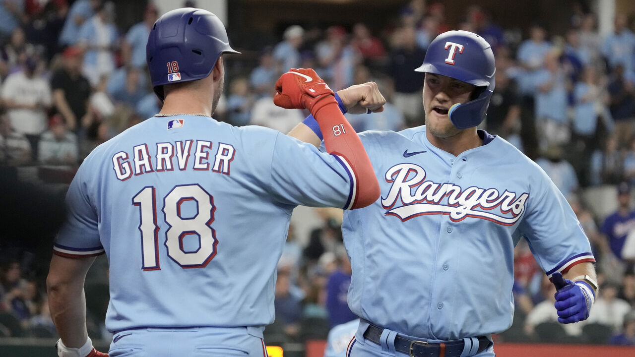 Semien, Perez help Rangers win 2-1 to sweep NL-champ Phils