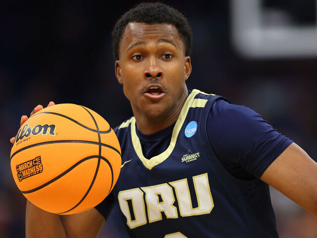 ORLANDO, FLORIDA - MARCH 16: Max Abmas #3 of the Oral Roberts Golden Eagles dribbles the ball during the second half in the first round of the NCAA Men's Basketball Tournament at Amway Center on March 16, 2023 in Orlando, Florida.
