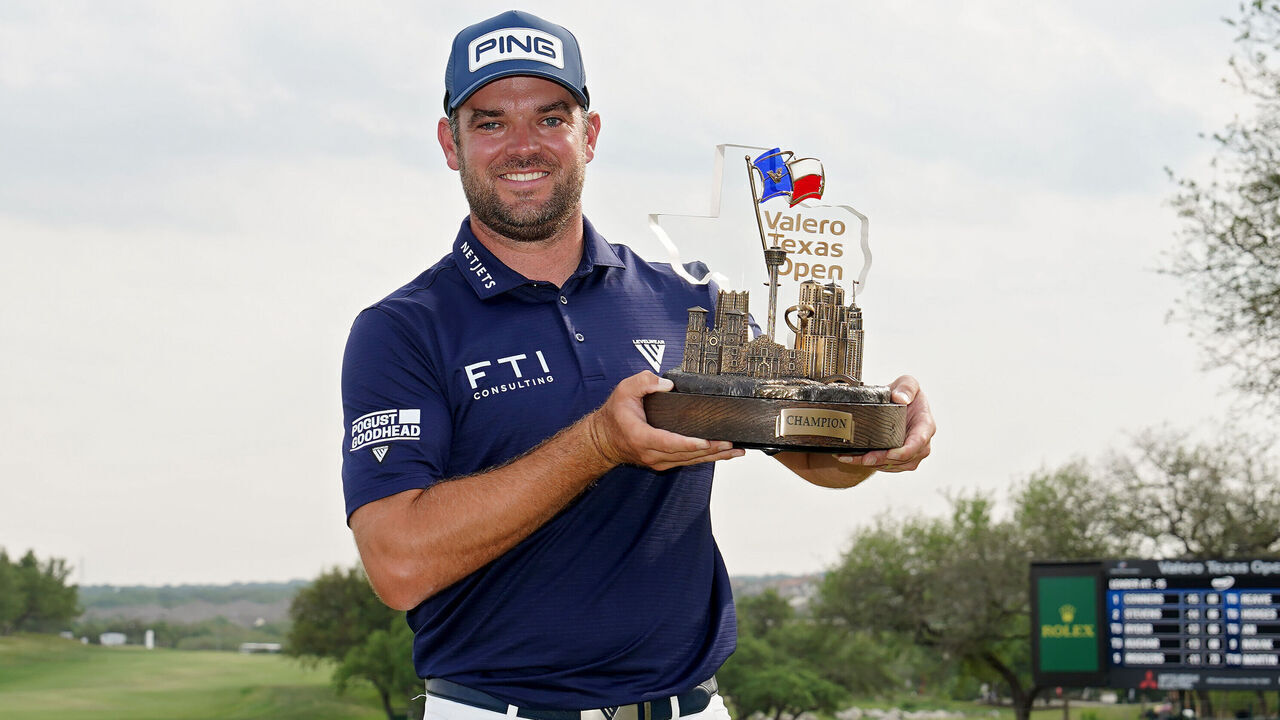 SAN ANTONIO, TEXAS - APRIL 02: Corey Conners of Canada poses with the trophy after winning the Valero Texas Open at TPC San Antonio on April 02, 2023 in San Antonio, Texas.