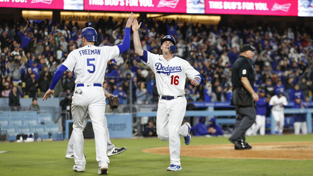 LOS ANGELES, CA - APRIL 03: Los Angeles Dodgers catcher Will Smith (16) scores on a single by designated hitter J.D. Martinez (28) in the fifth inning during a regular season game between the Colorado Rockies and Los Angeles Dodgers on April 3, 2023, at Dodger Stadium in Los Angeles, CA.