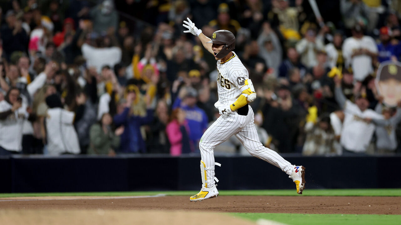 Ha-Seong Kim of the San Diego Padres runs to first base during a game  News Photo - Getty Images