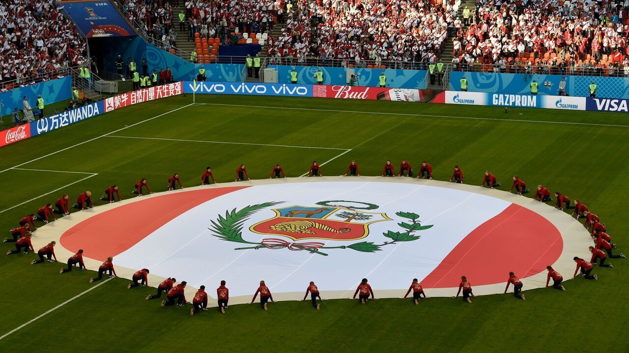 The national flag of Peru is seen on the pitch ahead of kick off of the Russia 2018 World Cup Group C football match between Peru and Denmark at the Mordovia Arena in Saransk on June 16, 2018.