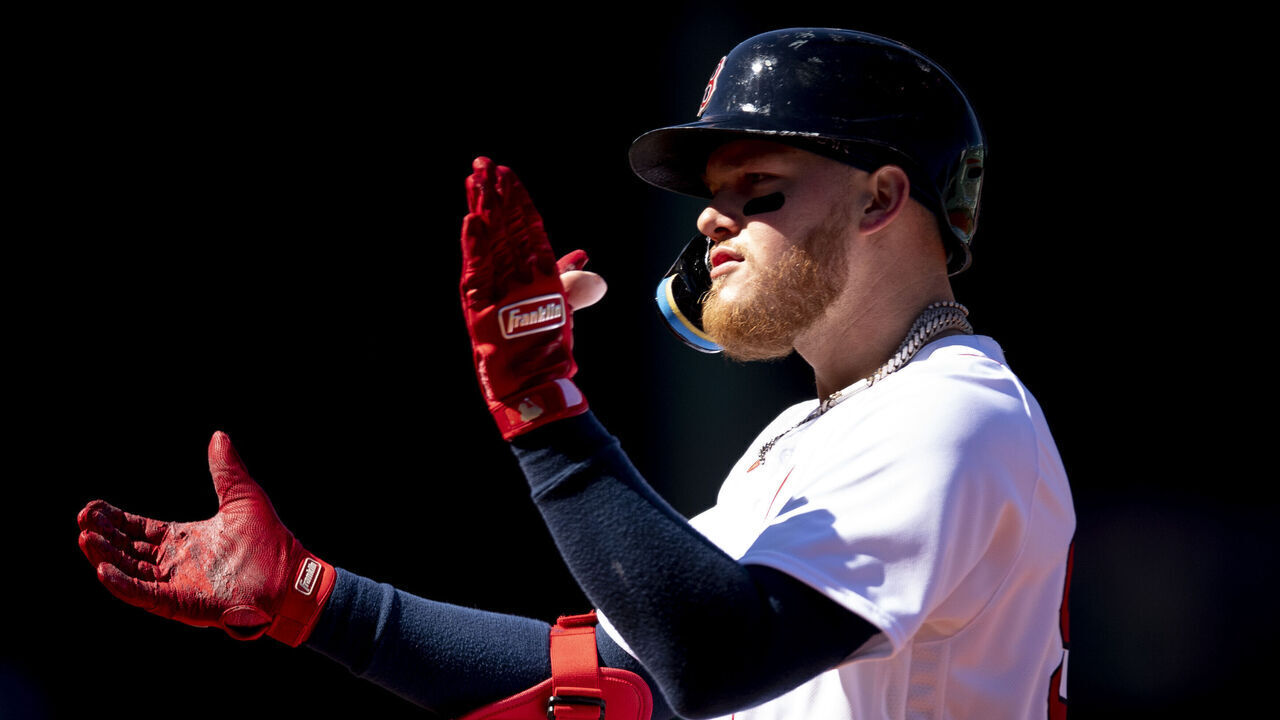 BOSTON, MA - APRIL 2: Alex Verdugo #99 of the Boston Red Sox reacts after hitting an rbi single during the third inning during the third inning of a game against the Baltimore Orioles on April 2, 2023 at Fenway Park in Boston, Massachusetts.