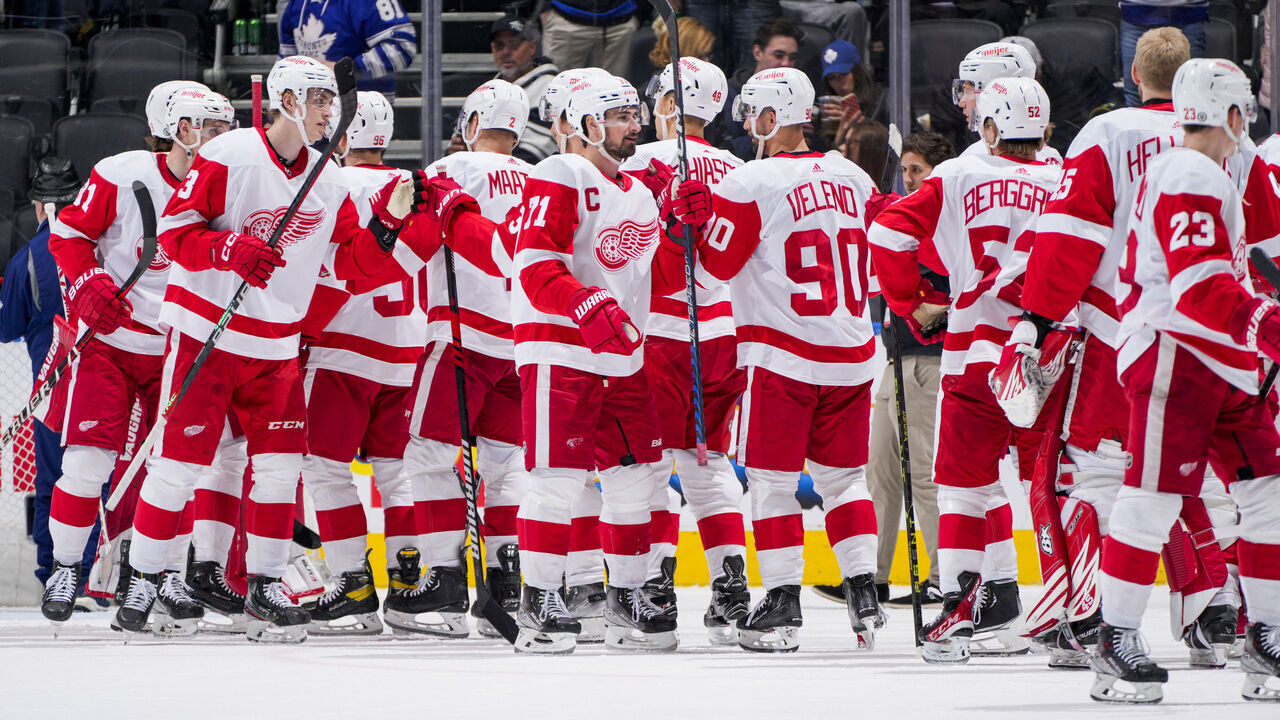 TORONTO, ON - APRIL 2: Dylan Larkin #71 of the Detroit Red Wings celebrates with teammates after defeating the Toronto Maple Leafs at the Scotiabank Arena on April 2, 2023 in Toronto, Ontario, Canada.