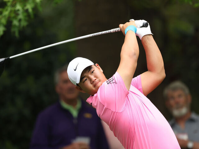 AUGUSTA, GEORGIA - APRIL 04: Tom Kim of South Korea plays his shot from the seventh tee during a practice round prior to the 2023 Masters Tournament at Augusta National Golf Club on April 04, 2023 in Augusta, Georgia.