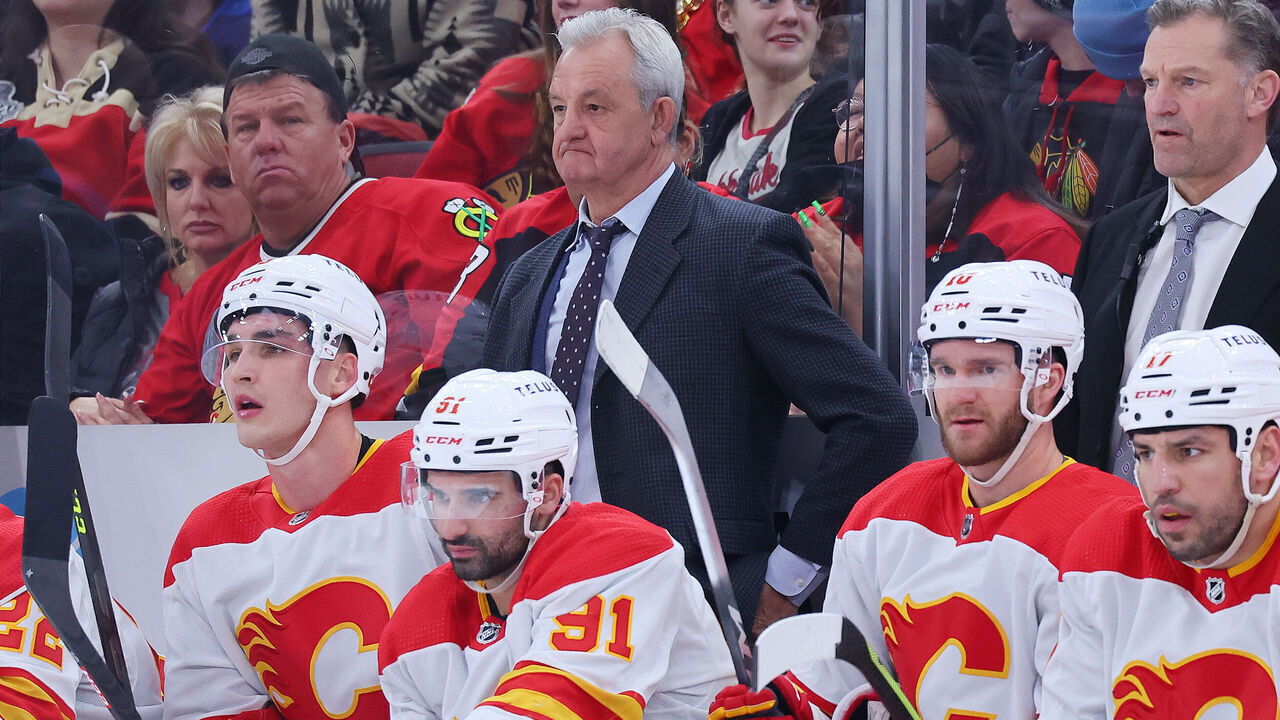 CHICAGO, ILLINOIS - JANUARY 08: Head coach Darryl Sutter of the Calgary Flames looks on against the Chicago Blackhawks at United Center on January 08, 2023 in Chicago, Illinois.