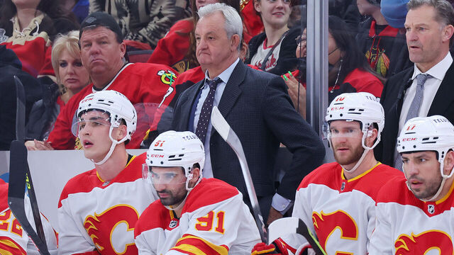 CHICAGO, ILLINOIS - JANUARY 08: Head coach Darryl Sutter of the Calgary Flames looks on against the Chicago Blackhawks at United Center on January 08, 2023 in Chicago, Illinois.