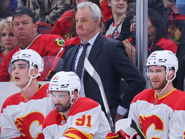 CHICAGO, ILLINOIS - JANUARY 08: Head coach Darryl Sutter of the Calgary Flames looks on against the Chicago Blackhawks at United Center on January 08, 2023 in Chicago, Illinois.