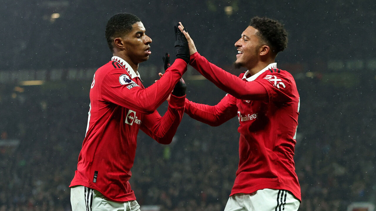 MANCHESTER, ENGLAND - APRIL 05: Marcus Rashford of Manchester United celebrates with teammate Jadon Sancho after scoring the team's first goal during the Premier League match between Manchester United and Brentford FC at Old Trafford on April 05, 2023 in Manchester, England.