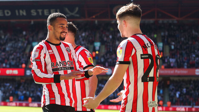 SHEFFIELD, ENGLAND - APRIL 07: Iliman Ndiaye of Sheffield United celebrates with teammates after scoring his side's first goal during the Sky Bet Championship between Sheffield United and Wigan Athletic at Bramall Lane on April 07, 2023 in Sheffield, England.