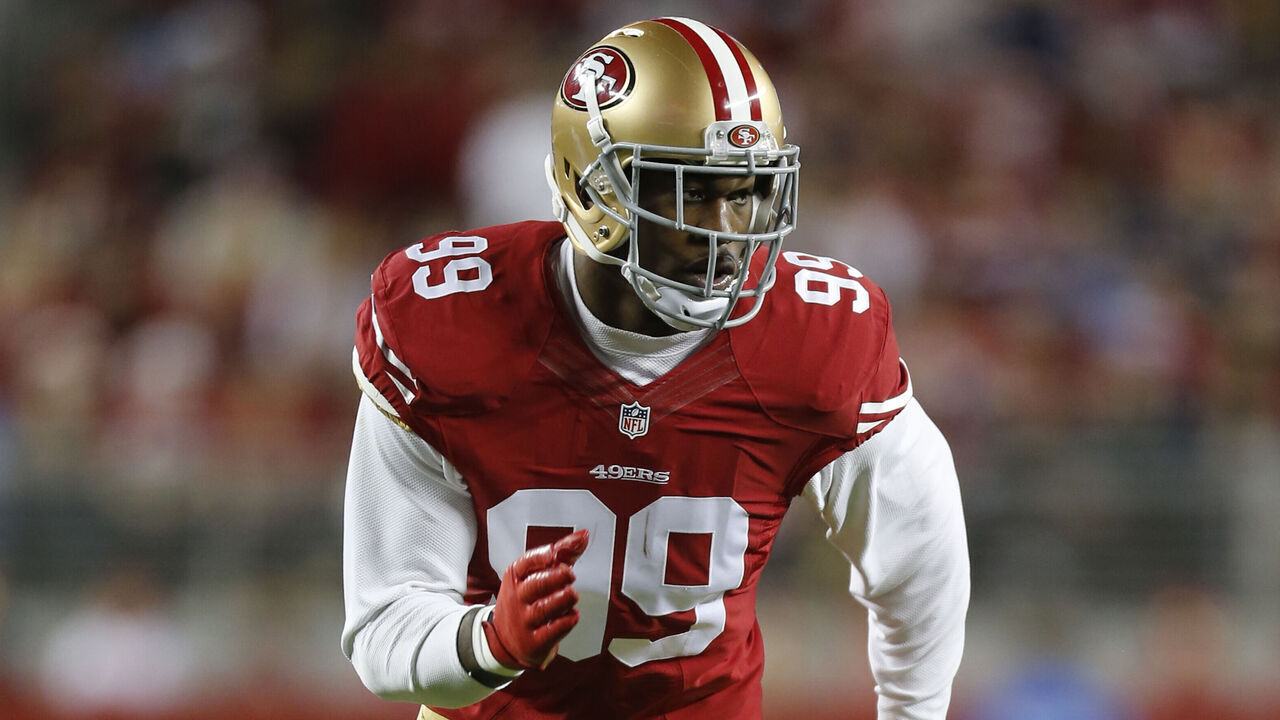 SANTA CLARA, CA - DECEMBER 20: Aldon Smith #99 of the San Francisco 49ers rushes the passer during the game against the San Diego Chargers at Levi Stadium on December 20, 2014 in Santa Clara, California. The Chargers defeated the 49ers 38-35 in overtime.