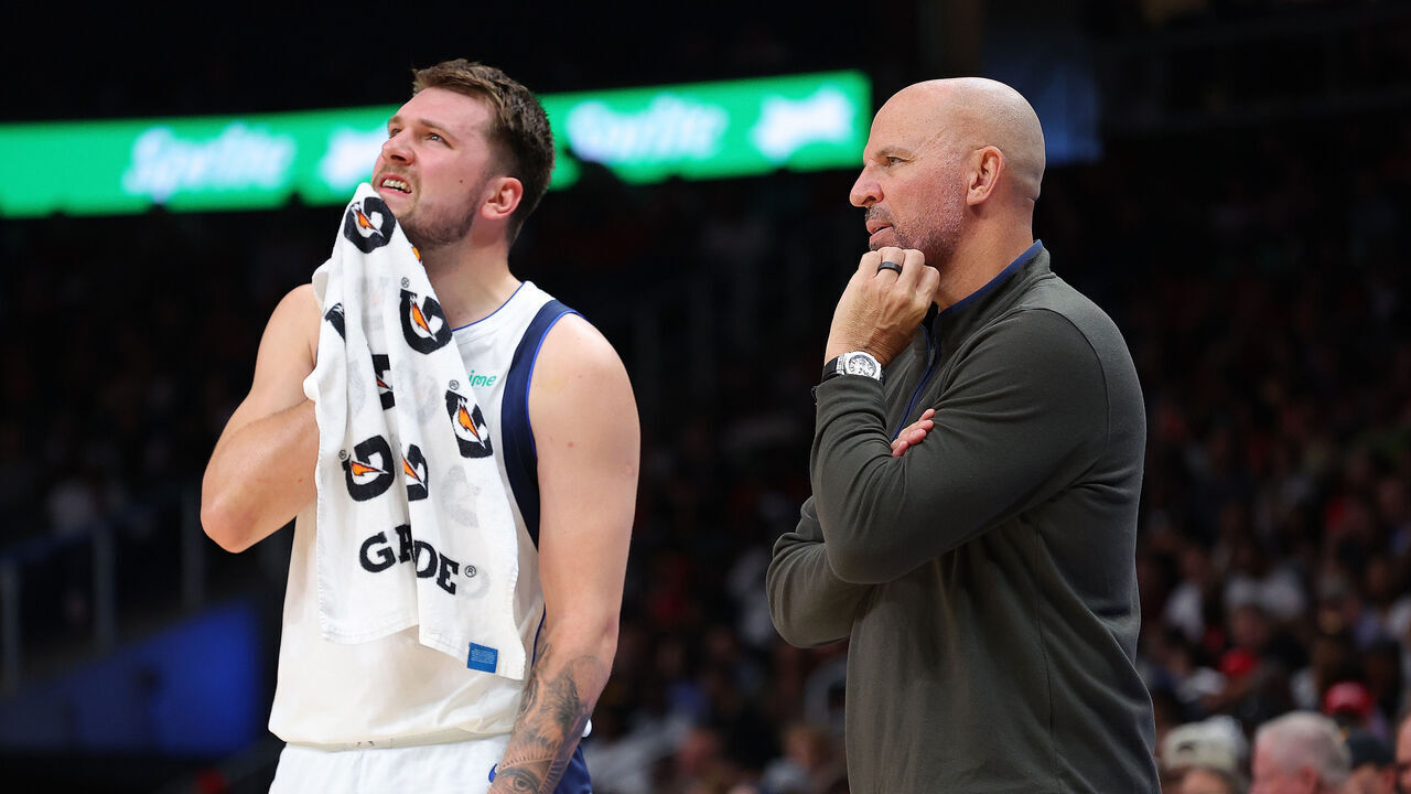 ATLANTA, GEORGIA - APRIL 02: Head coach Jason Kidd converses with Luka Doncic #77 of the Dallas Mavericks against the Atlanta Hawks during the first quarter at State Farm Arena on April 02, 2023 in Atlanta, Georgia.