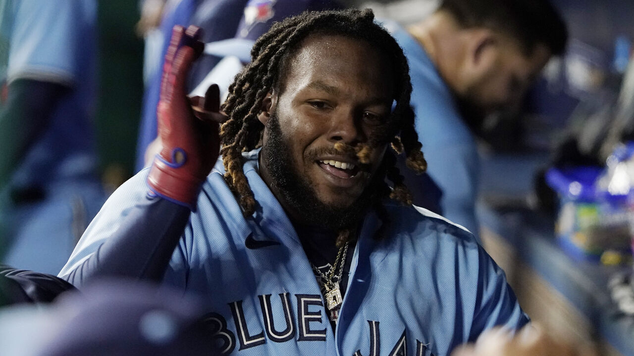 KANSAS CITY, MISSOURI - APRIL 05: Vladimir Guerrero Jr. #27 of the Toronto Blue Jays celebrates his home run in the eighth inning against the Kansas City Royals at Kauffman Stadium on April 05, 2023 in Kansas City, Missouri.