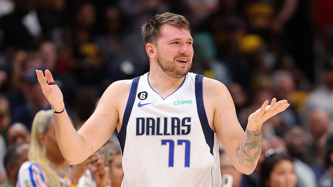 ATLANTA, GEORGIA - APRIL 02: Luka Doncic #77 of the Dallas Mavericks reacts against the Atlanta Hawks during the fourth quarter at State Farm Arena on April 02, 2023 in Atlanta, Georgia.