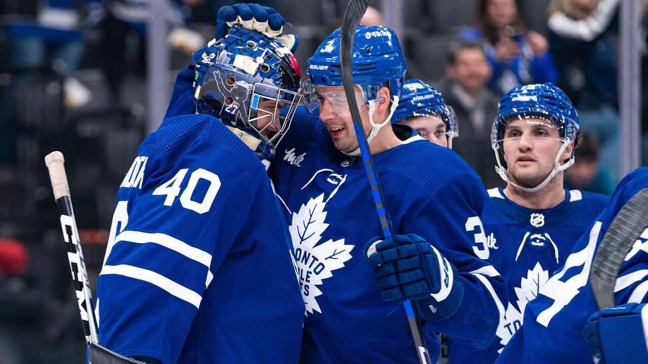 TORONTO, CANADA - APRIL 08: Jett Alexander #40 and Justin Holl #3 of the Toronto Maple Leafs celebrate their win against the Montreal Canadiens at the Scotiabank Arena on April 08, 2023 in Toronto, Ontario, Canada.