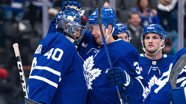 TORONTO, CANADA - APRIL 08: Jett Alexander #40 and Justin Holl #3 of the Toronto Maple Leafs celebrate their win against the Montreal Canadiens at the Scotiabank Arena on April 08, 2023 in Toronto, Ontario, Canada.